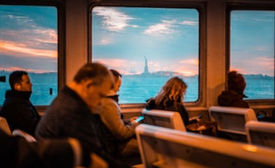people transport boat sea windows glass window sitting traveling vacation winter person water sky usa