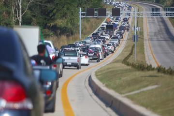 Traffic jam on the highway,traffic congestion during rush hour concept of traveling.
