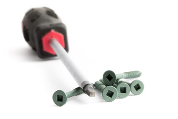 a close up of a square drive robertson style screwdriver and square drive socket wood screws that...