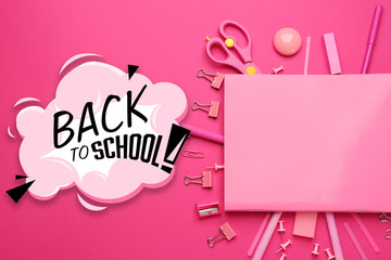 Text BACK TO SCHOOL with different stationery on color background