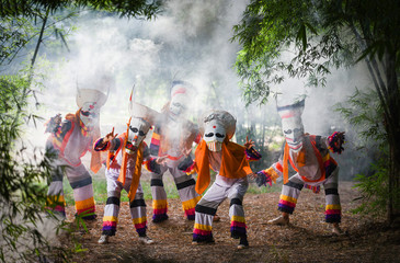 Phi ta khon festival ghost mask and colorful costume fun traditional thailand mask the show art and...