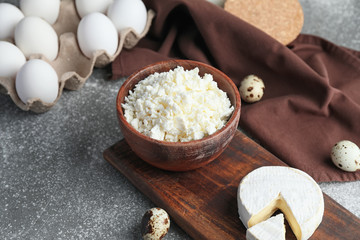 Different dairy products on grey background