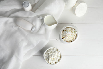 Fototapeta premium Different dairy products on white wooden background