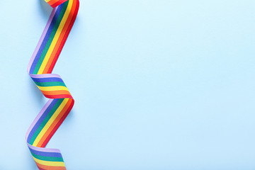 Rainbow ribbon of LGBT on color background