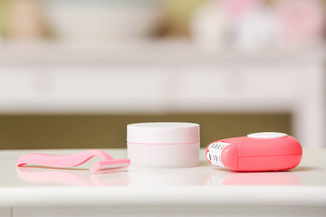Set for hair removal on table in bathroom