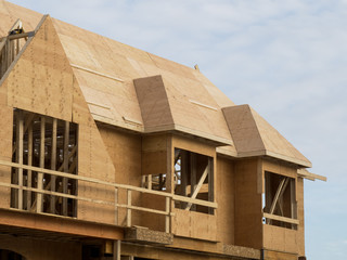 Fototapeta na wymiar plywood roof sheathing on a residential construction project