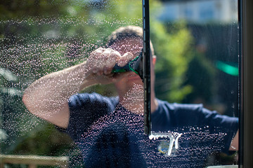Window Washing Man with squeegee 