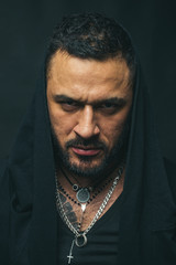 Man face. Portrait of adult man of Caucasian appearance isolated on black background. Man face close up.