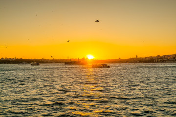Beautiful seascape of bosphorus strait with golden sunset in Istanbul, Turkey.