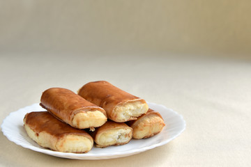 Homemade cake with cottage cheese on a white plate