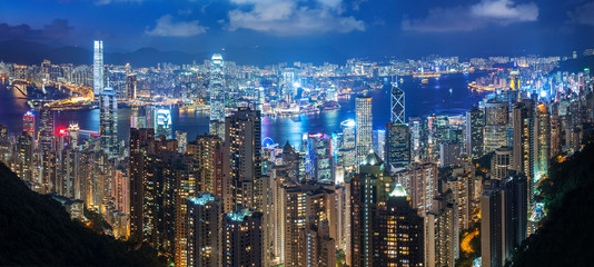 Naklejka premium Victoria Harbor of Hong Kong city at night