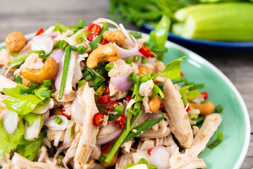 Steamed rip chicken spicy salad with shallot, celery, chili and Scallion.