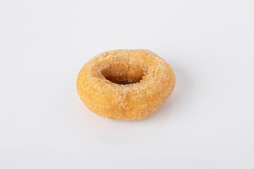 Fototapeta na wymiar Donuts white sugar on a white background.