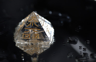 Crystal in Pyramid Shape With REIKI symbols : Cho Ku Rei means Power, Sei Hei ki means Harmony, Hon sha ze sho nen means Distance, Dai ko myo means Master, Raku =completion