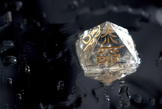 Crystal in Pyramid Shape With REIKI symbols : Cho Ku Rei means Power, Sei Hei ki means Harmony, Hon sha ze sho nen means Distance, Dai ko myo means Master, Raku =completion