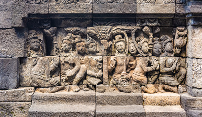 Stone carvings in Borobudur Temple, Magelang, Central Java, Indonesia. Borobudur Temple is the...