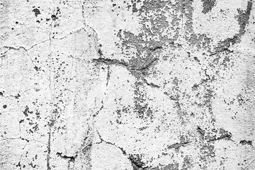 Texture of a concrete wall with cracks and scratches which can be used as a background