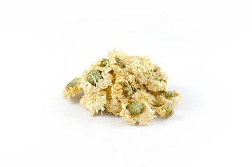 Pile of dry flowers tea leaves on a white background close-up.