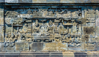 Stone carvings in Borobudur Temple, Magelang, Central Java, Indonesia. Borobudur Temple is the...