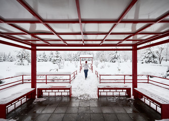 Woman at winter Japanese Garden
