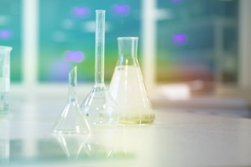 Colourful glass bottles for lab procedures bottles and flasks. essentia oils products-treatment medical 