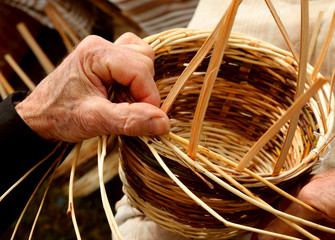 Hand of senior and wicker basket