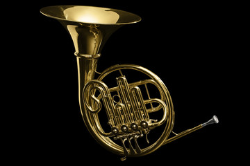 French Horn over black plain background