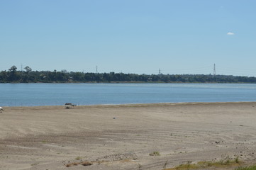 Clear river surrounded by forest on the banks