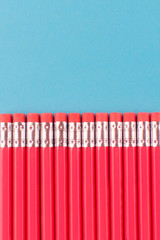 Fototapeta premium many pencils lie on a colored background, only the part where the grater is visible