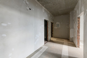 Russia, Moscow- October 17, 2019: interior room apartment rough repair for self-finishing. interior decoration, bare walls of the room, stage of construction