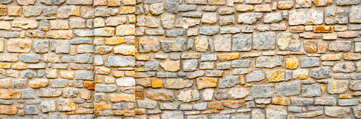 Stone wall banner, background. Wall pattern texture background. Surface with asymmetrical stones....