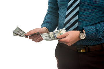 business man in suit holding us dollar bills, isolated on white