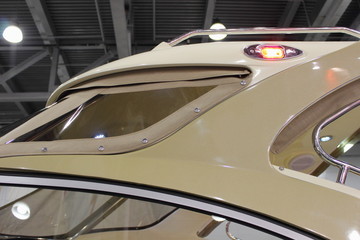 Hardtop cabin design of luxury motor yacht close up in Elling, boats maintenance
