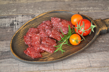 Sausage Fuet. Square salami with spices. Top view