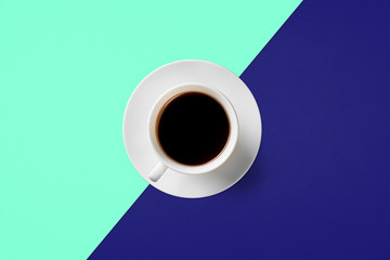  cup of coffee on a background of Phantom Blue and Aqua Menthe color