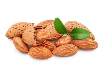 Almonds nuts with leaves isolated on white background with clipping path and full depth of field.
