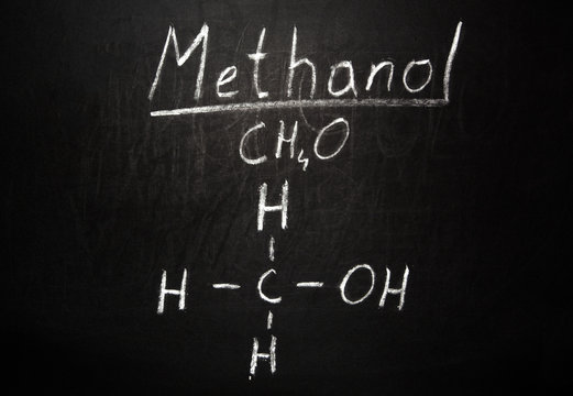 Formula alcohol methanol on blackboard in chemistry class
