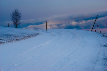 snowy mountain road after heavy snowfall