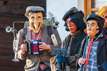 Ancient carnival of Sauris. Traditional wooden masks. Italy