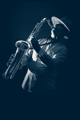 Saxophone Player in Concert (foggy ablue toned)