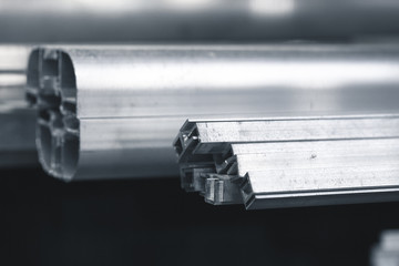 Assorted aluminum profile, industrial background
