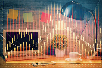 Multi exposure of graph and financial info and work space with computer background. Concept of...