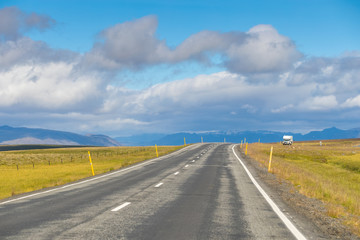 Summertime view cars on the Road trip on the countryside road in Iceland