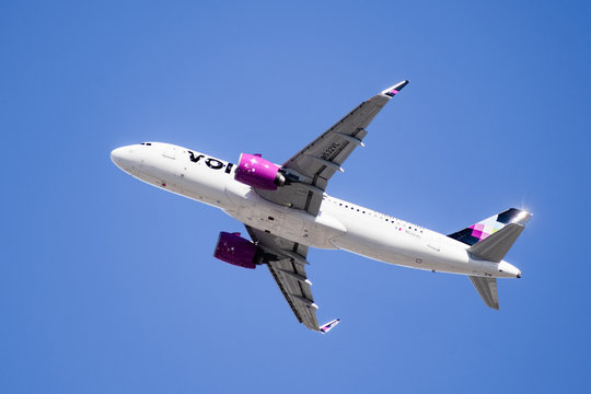 Feb 11, 2020 San Jose / CA / USA - Volaris airlines aircraft ascending after taking off from Norman Y. Mineta San Jose International Airport, Silicon Valley; Volaris is a Mexican low-cost airline