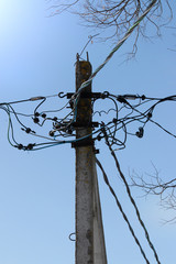 Electric pole with wires and power equipment