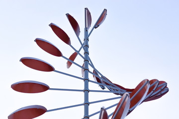 abstract red windmill on a blue sky background 5