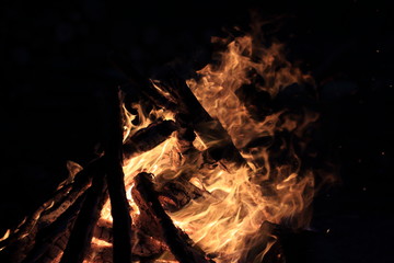 blue and green candles burning in a colored interior