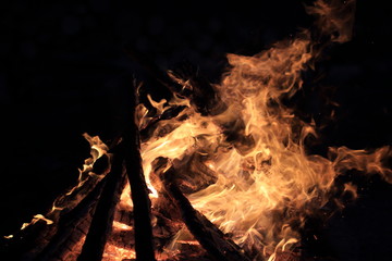 blue and green candles burning in a colored interior