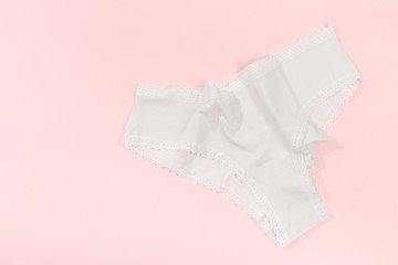 Female panties over pink  background - Image