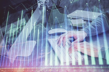 Double exposure of financial graph with man works in office on background. Concept of analysis.